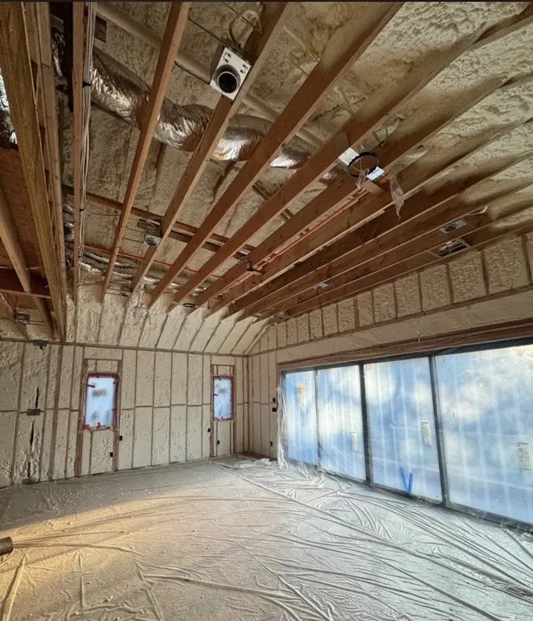 Interior walls and ceiling insulated with spray foam during new construction in Oakbrook